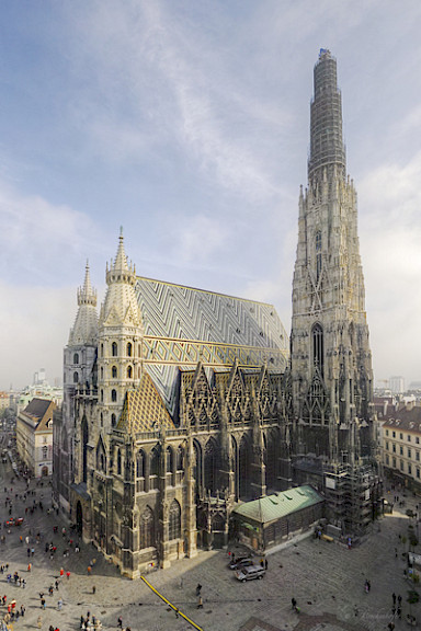 Westwerk north section and peak of south tower steeple still under construction, scaffold from the base